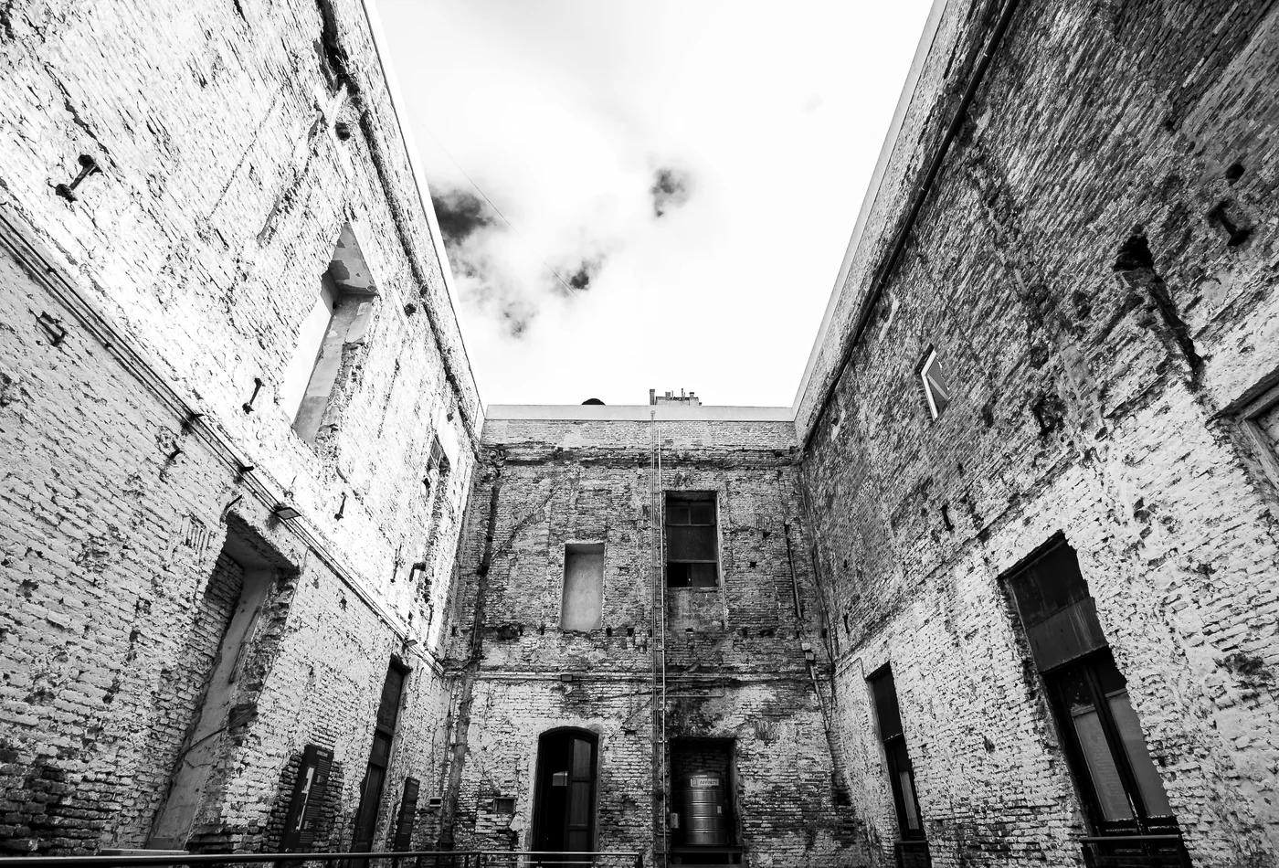 A Buenos Aires brick courtyard, representative of Barracas' older industrial buildings, not Señor Tango's own venue